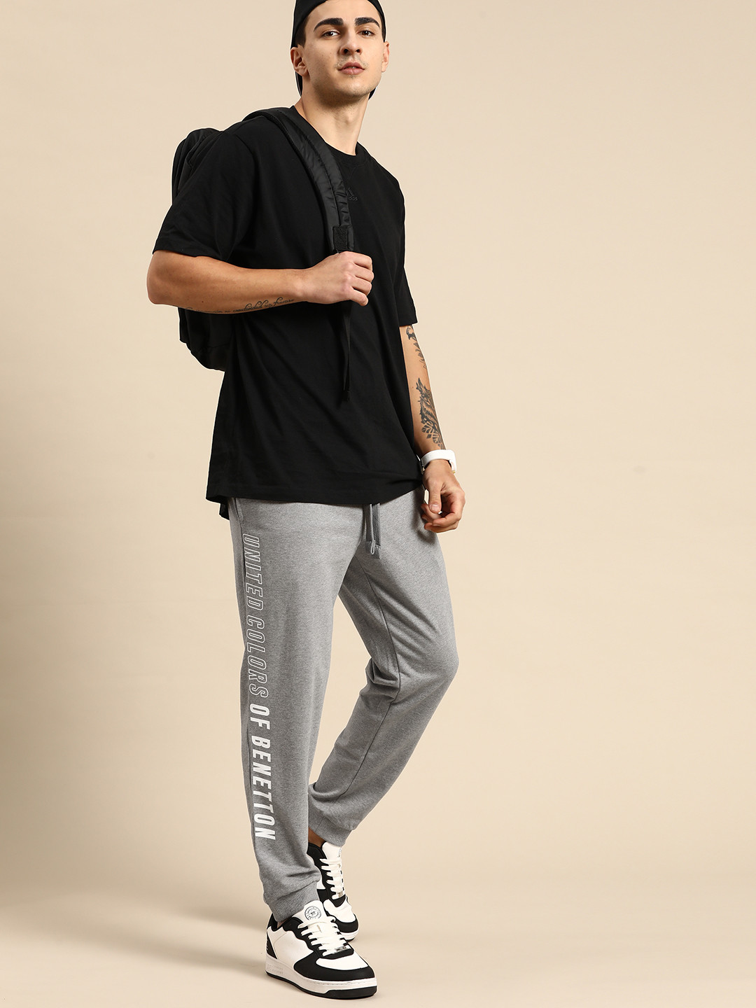 United Colors of Benetton Men Melange Brand Printed Pure Cotton Printed Joggers, Grey melange
United Colors of Benetton Men Melange Brand Printed Pure Cotton Printed Joggers, Grey melange
