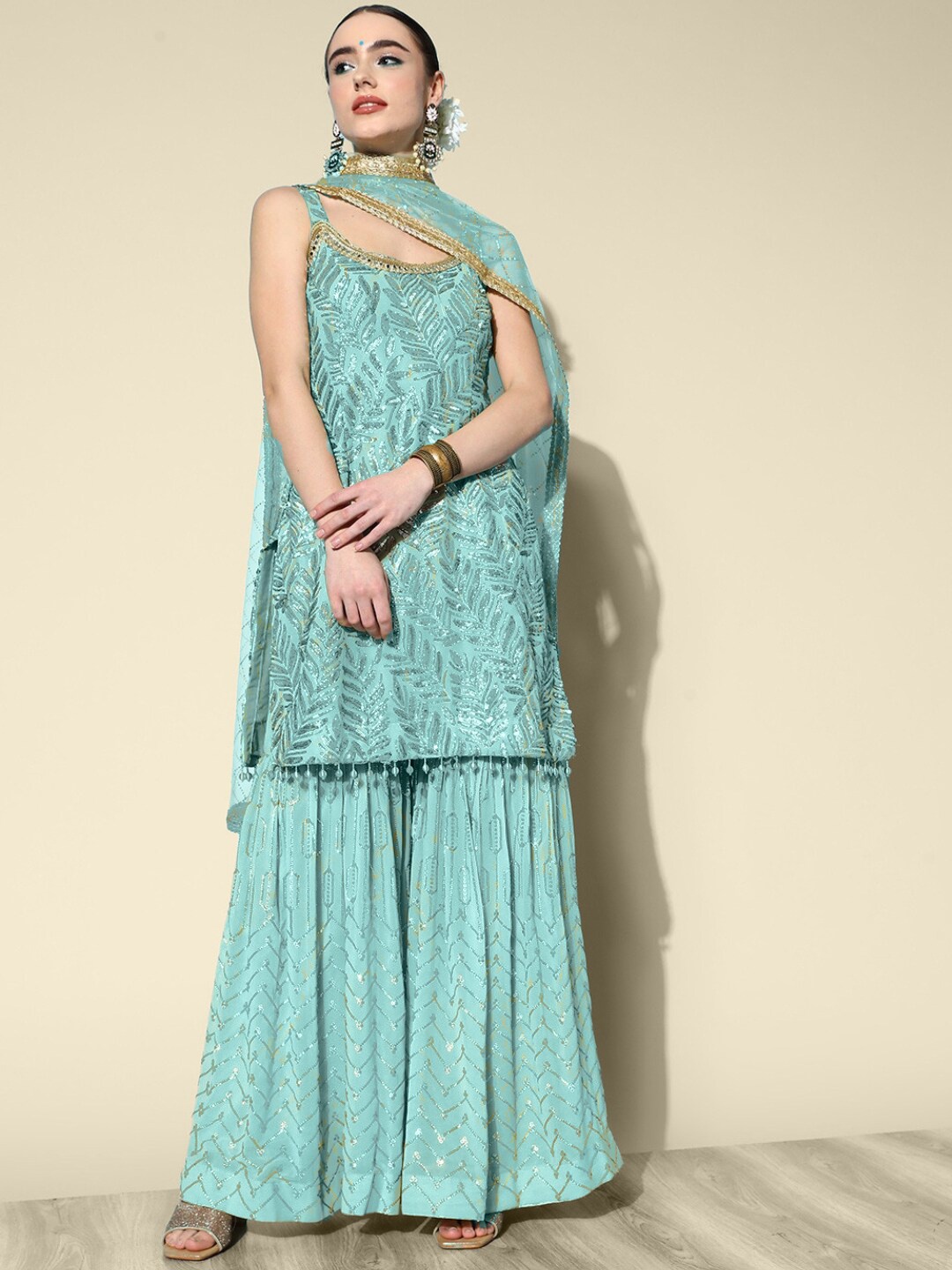 Chhabra 555 Turquoise Blue Embellished Sequinned Georgette Kurta With Sharara & Dupatta
Chhabra 555 Turquoise Blue Embellished Sequinned Georgette Kurta With Sharara & Dupatta