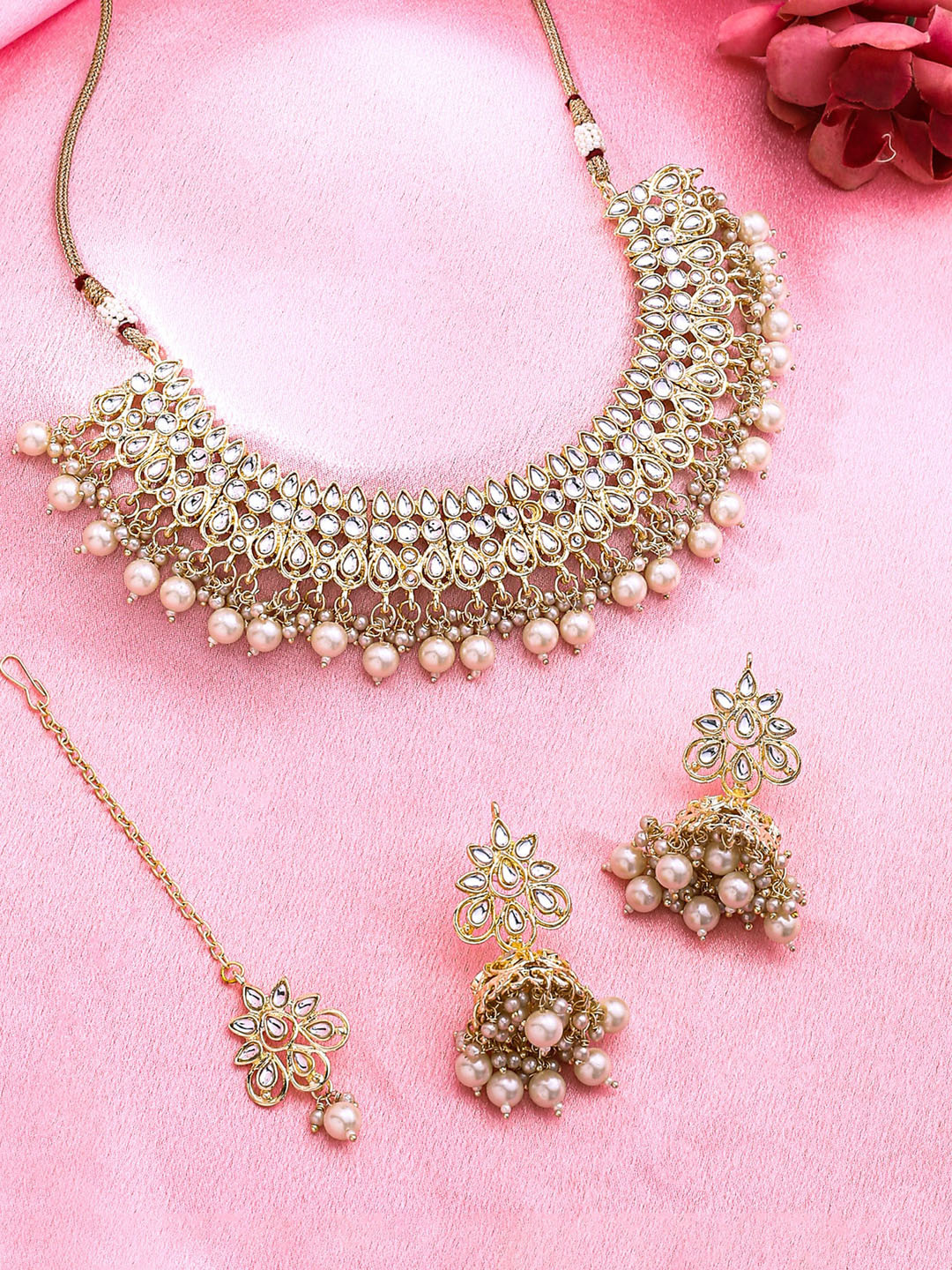 Yellow Chimes Gold-Plated Kundan Studded Choker Jewellery set with Maangtikka, White
Yellow Chimes Gold-Plated Kundan Studded Choker Jewellery set with Maangtikka, White