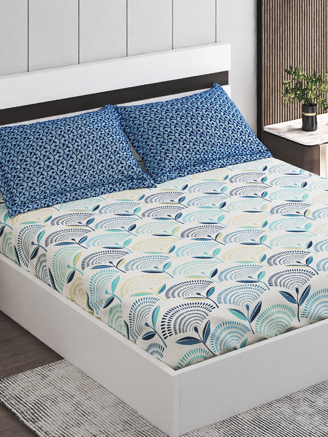 Home Centre Corsica Blue & Green Printed Fitted 144 TC Queen Bedsheet With 2 Pillow Covers
Home Centre Corsica Blue & Green Printed Fitted 144 TC Queen Bedsheet With 2 Pillow Covers