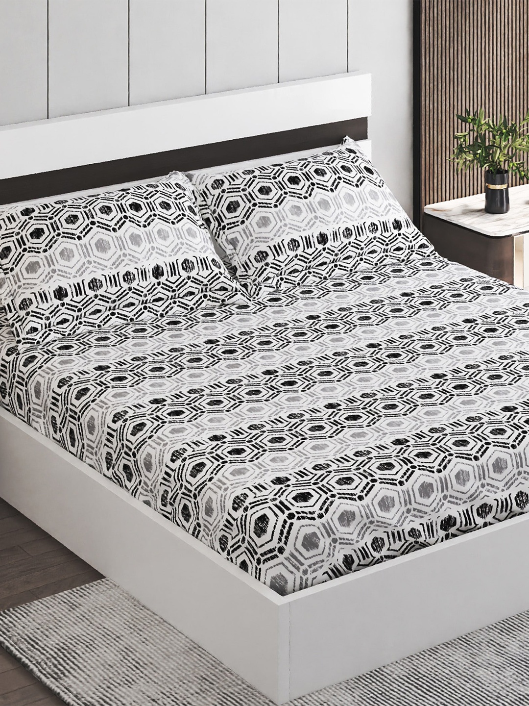 Home Centre Dallas Black & White Geometric 144 TC Cotton Queen Bedsheet & 2 Pillow Covers
Home Centre Dallas Black & White Geometric 144 TC Cotton Queen Bedsheet & 2 Pillow Covers