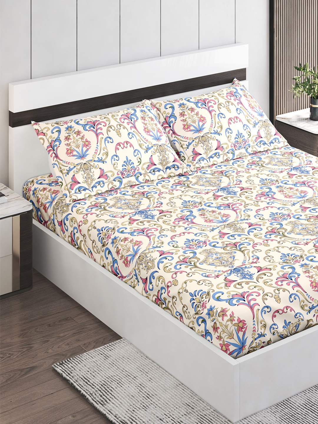 Home Centre Grandeur Blue & Green Printed Cotton 300 TC King Bedsheet With 2 Pillow Covers
Home Centre Grandeur Blue & Green Printed Cotton 300 TC King Bedsheet With 2 Pillow Covers