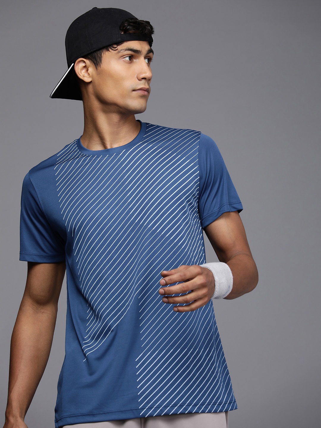 HRX by Hrithik Roshan Striped Anti-Microbial Rapid-Dry Training Sports T-shirt, Navy blue
HRX by Hrithik Roshan Striped Anti-Microbial Rapid-Dry Training Sports T-shirt, Navy blue