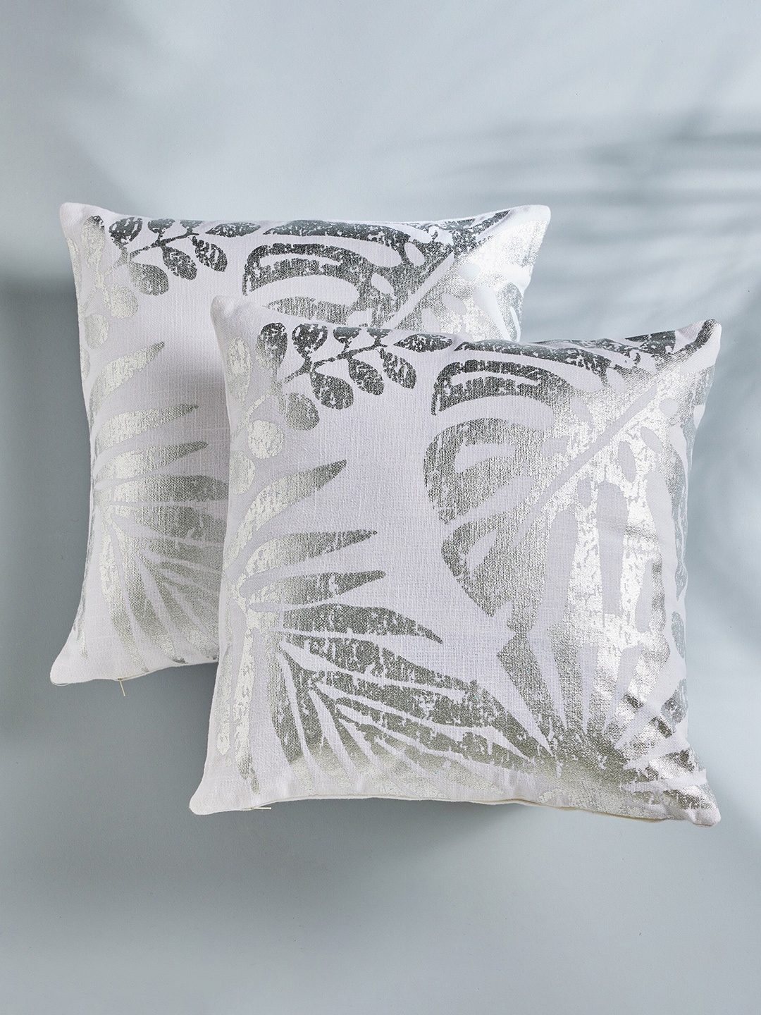Home Centre Celestial White & Silver-Toned 2 Pieces Floral Square Cotton Cushion Covers
Home Centre Celestial White & Silver-Toned 2 Pieces Floral Square Cotton Cushion Covers