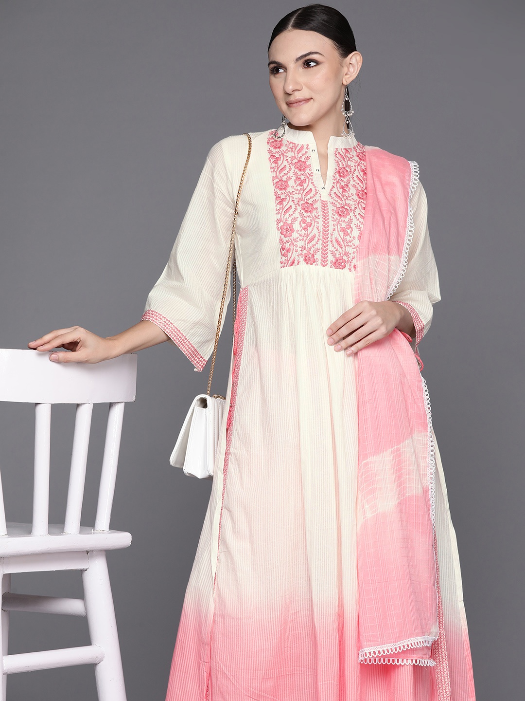 Indo Era Women Floral Yoke Design Pleated Thread Work Cotton Kurta with Trousers & Dupatta, Off white
Indo Era Women Floral Yoke Design Pleated Thread Work Cotton Kurta with Trousers & Dupatta, Off white