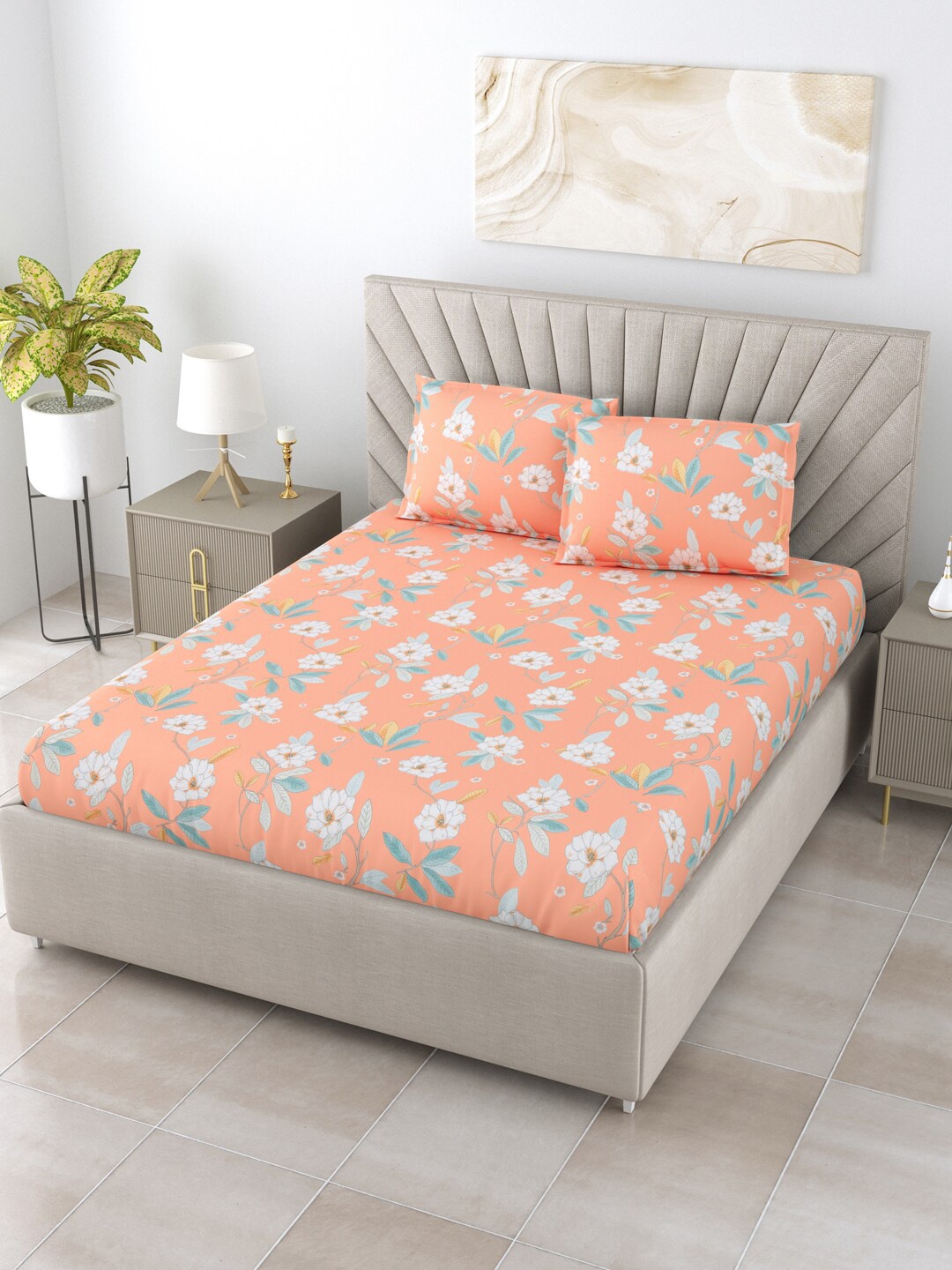 Salona Bichona Peach-Coloured & White Printed 144 TC Queen Bedsheet & 2 Pillow Covers
Salona Bichona Peach-Coloured & White Printed 144 TC Queen Bedsheet & 2 Pillow Covers