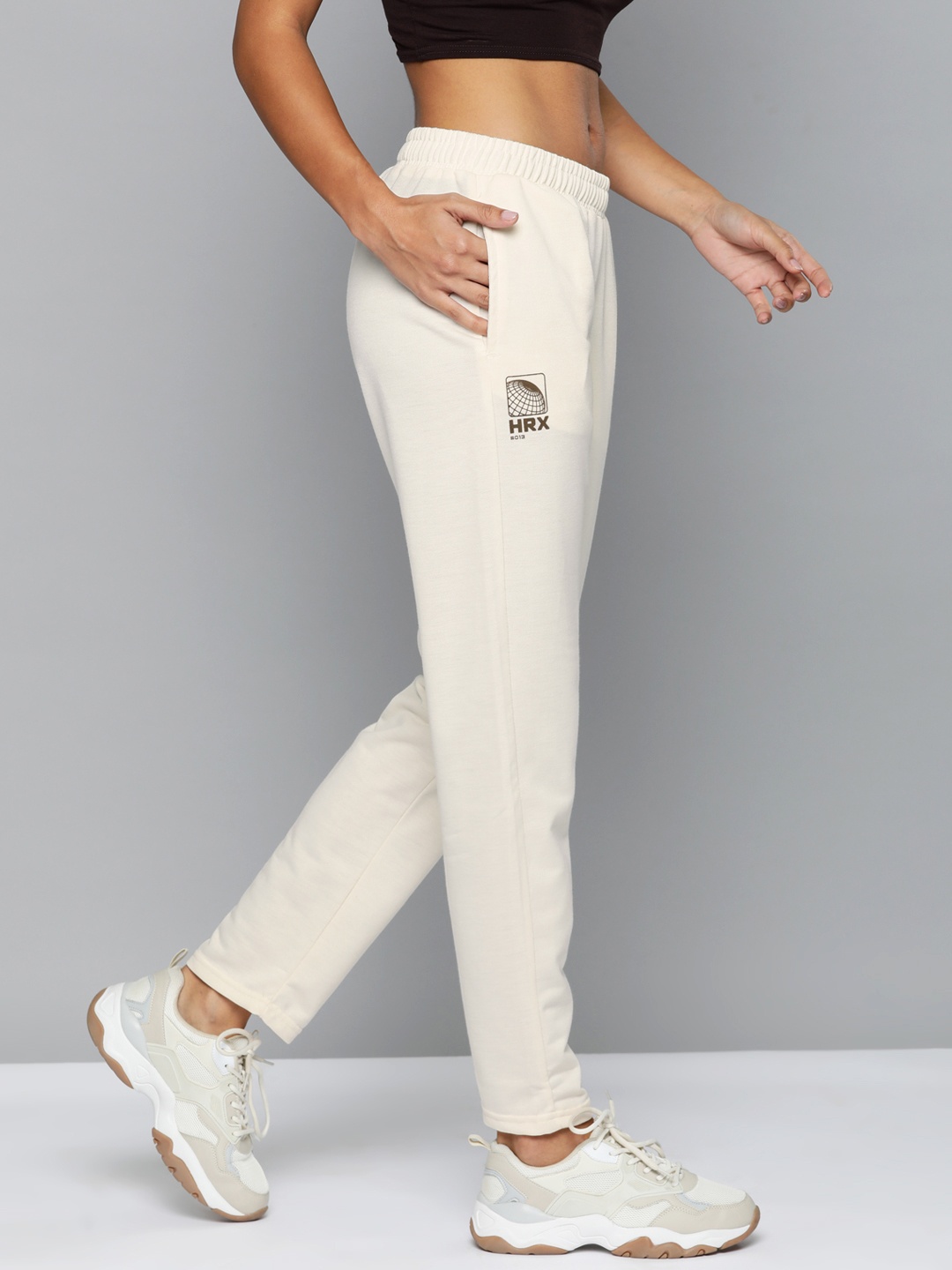 HRX by Hrithik Roshan Women Solid Minimal Brand Print Lifestyle Track Pants, Off white
HRX by Hrithik Roshan Women Solid Minimal Brand Print Lifestyle Track Pants, Off white