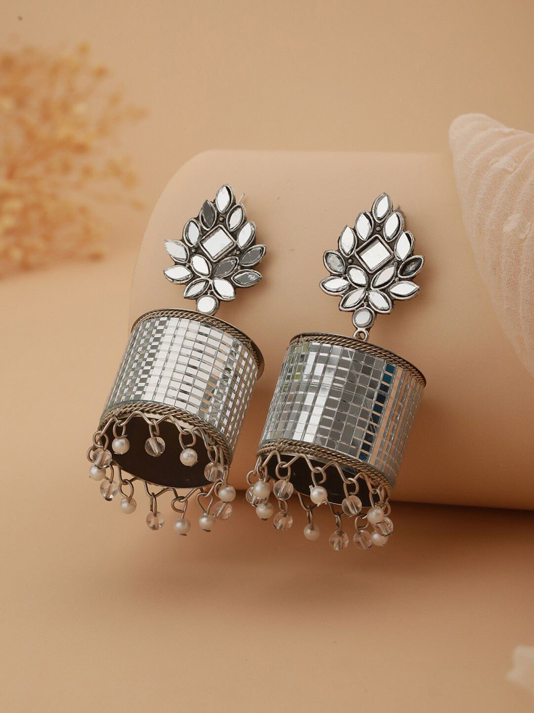 Aadvik Designs Silver-Plated Contemporary Jhumkas Earrings
Aadvik Designs Silver-Plated Contemporary Jhumkas Earrings