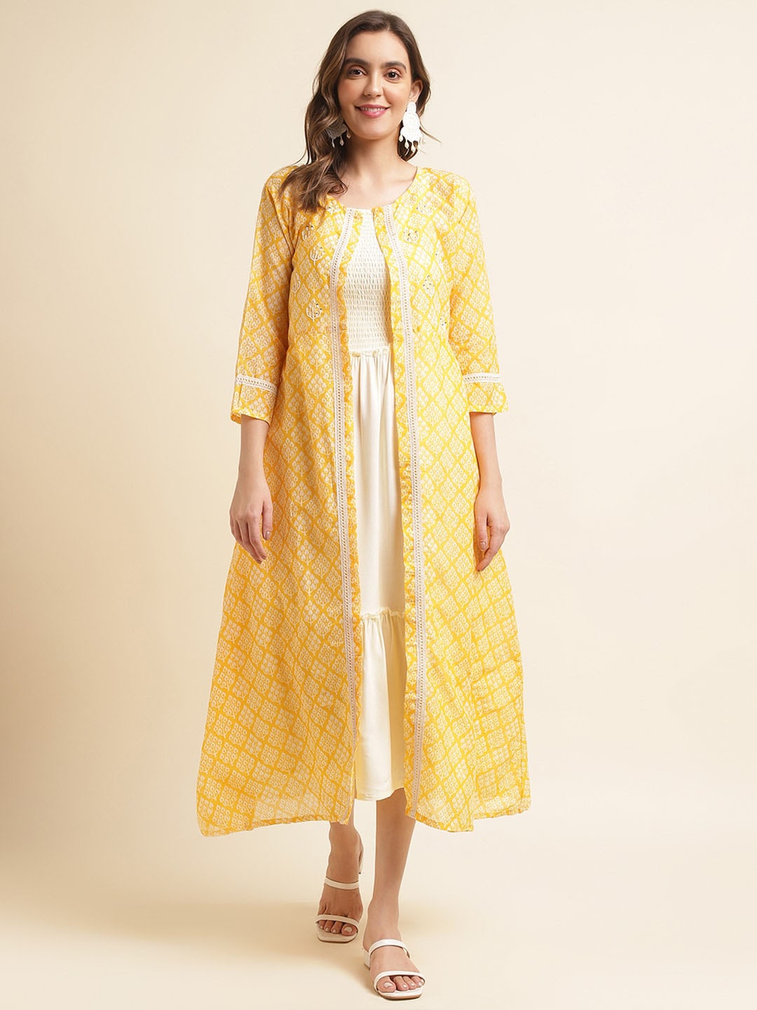 Ishin Off-White Shoulder Straps Smocked Tiered Cotton Fit & Flare Ethnic Dress With Shrug
Ishin Off-White Shoulder Straps Smocked Tiered Cotton Fit & Flare Ethnic Dress With Shrug