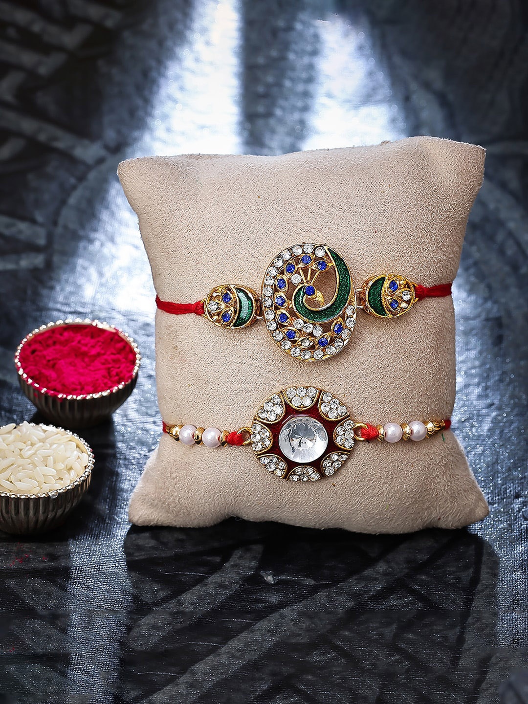 Sukkhi Rakhi Set Of 2 Gold-Plated Stone-Studded Rakhi With Roli, Rice & Greeting Card
Sukkhi Rakhi Set Of 2 Gold-Plated Stone-Studded Rakhi With Roli, Rice & Greeting Card