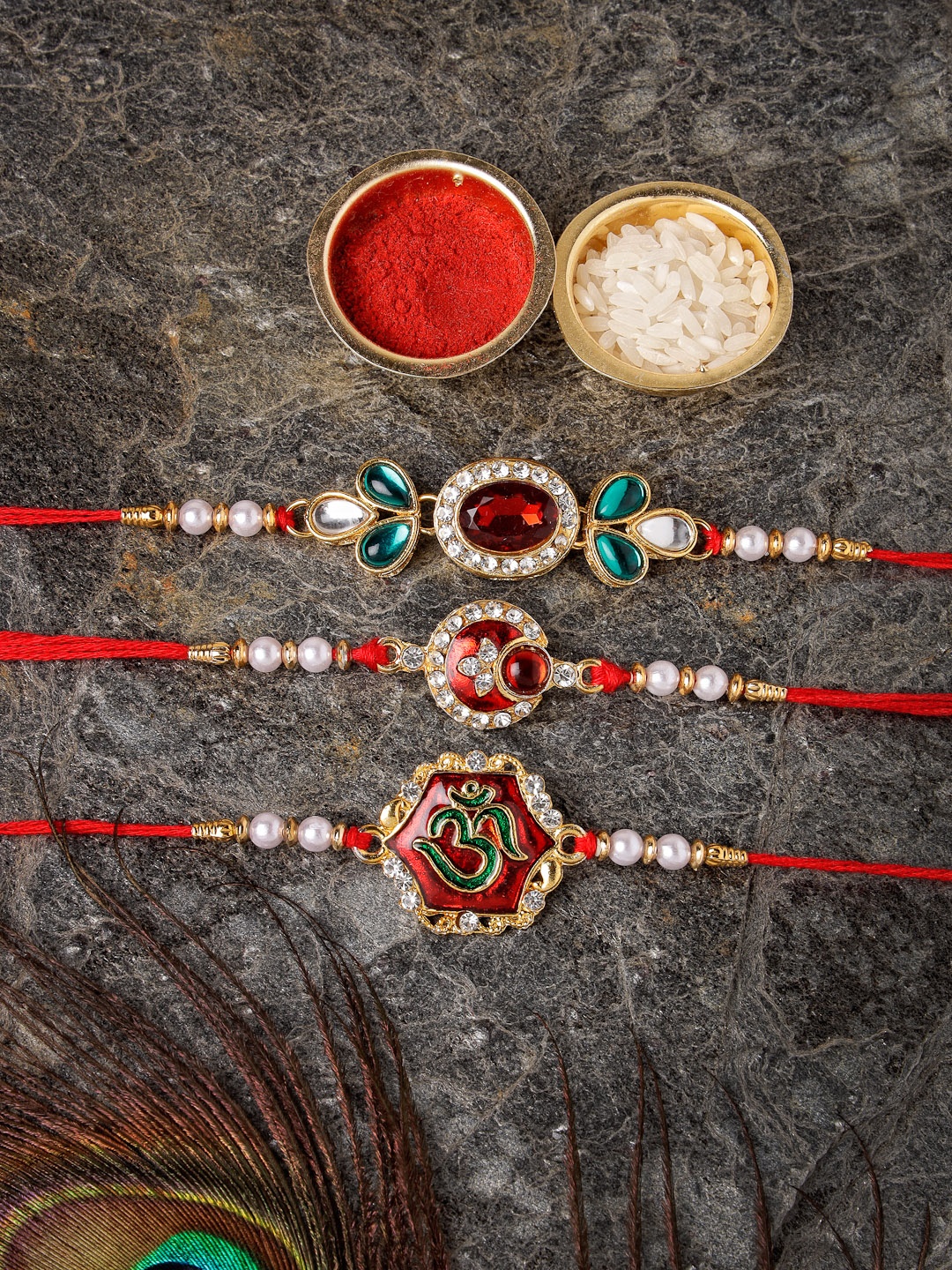 Sukkhi Rakhi Set Of 3 Gold-Plated Stone-Studded Rakhi With Roli, Rice & Greeting Card
Sukkhi Rakhi Set Of 3 Gold-Plated Stone-Studded Rakhi With Roli, Rice & Greeting Card