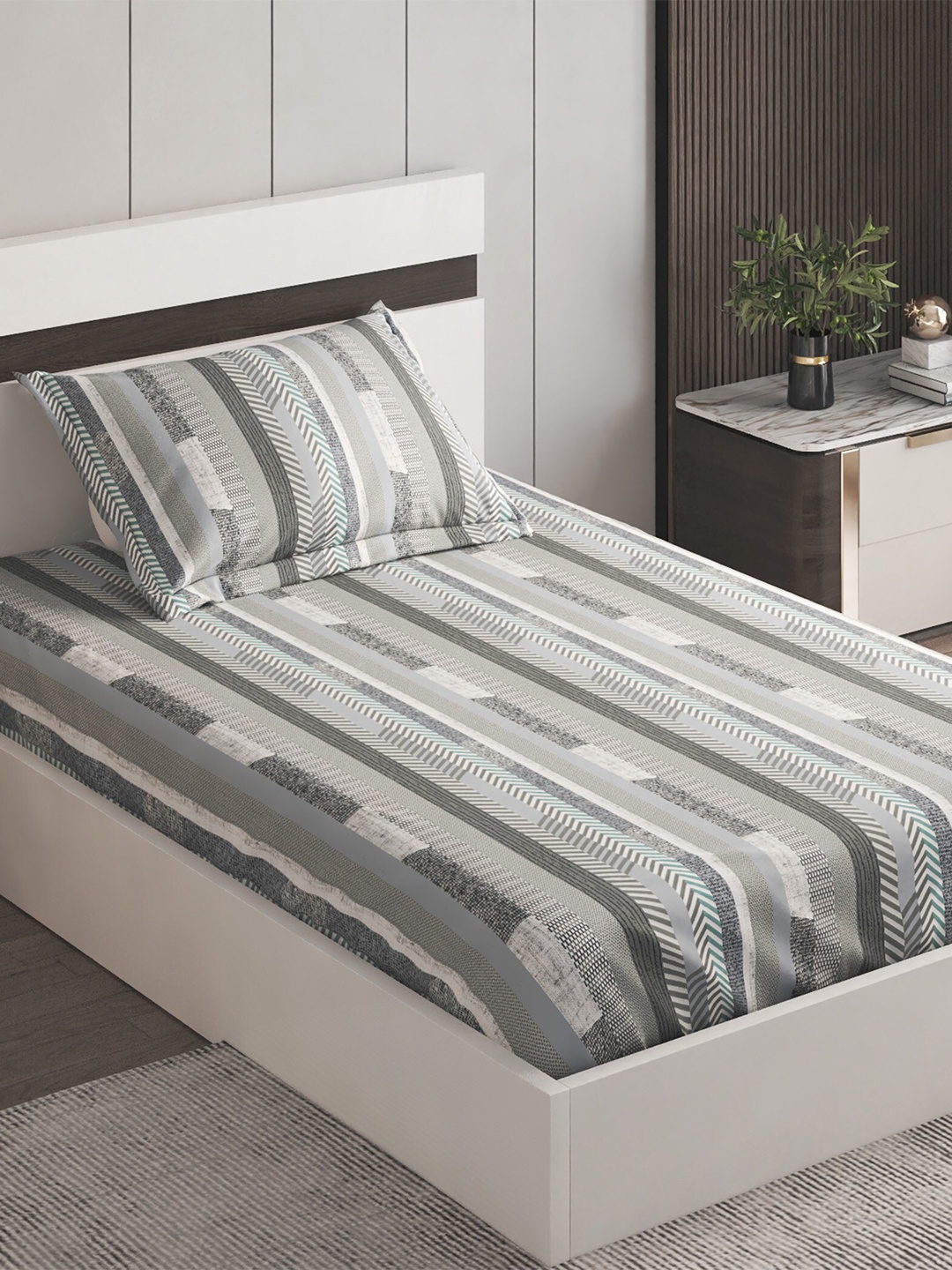 Home Centre Dallas Grey & White Striped Cotton 144 TC Single Bedsheet With 1 Pillow Cover
Home Centre Dallas Grey & White Striped Cotton 144 TC Single Bedsheet With 1 Pillow Cover