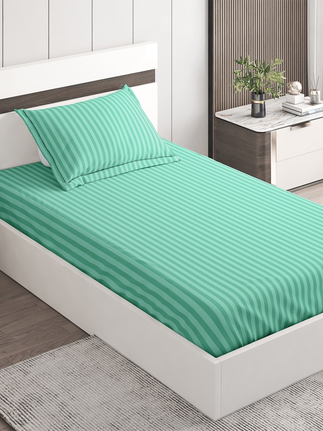Home Centre Pacific Juniper Green Striped 144 TC Single Bedsheet With 1 Pillow Covers
Home Centre Pacific Juniper Green Striped 144 TC Single Bedsheet With 1 Pillow Covers