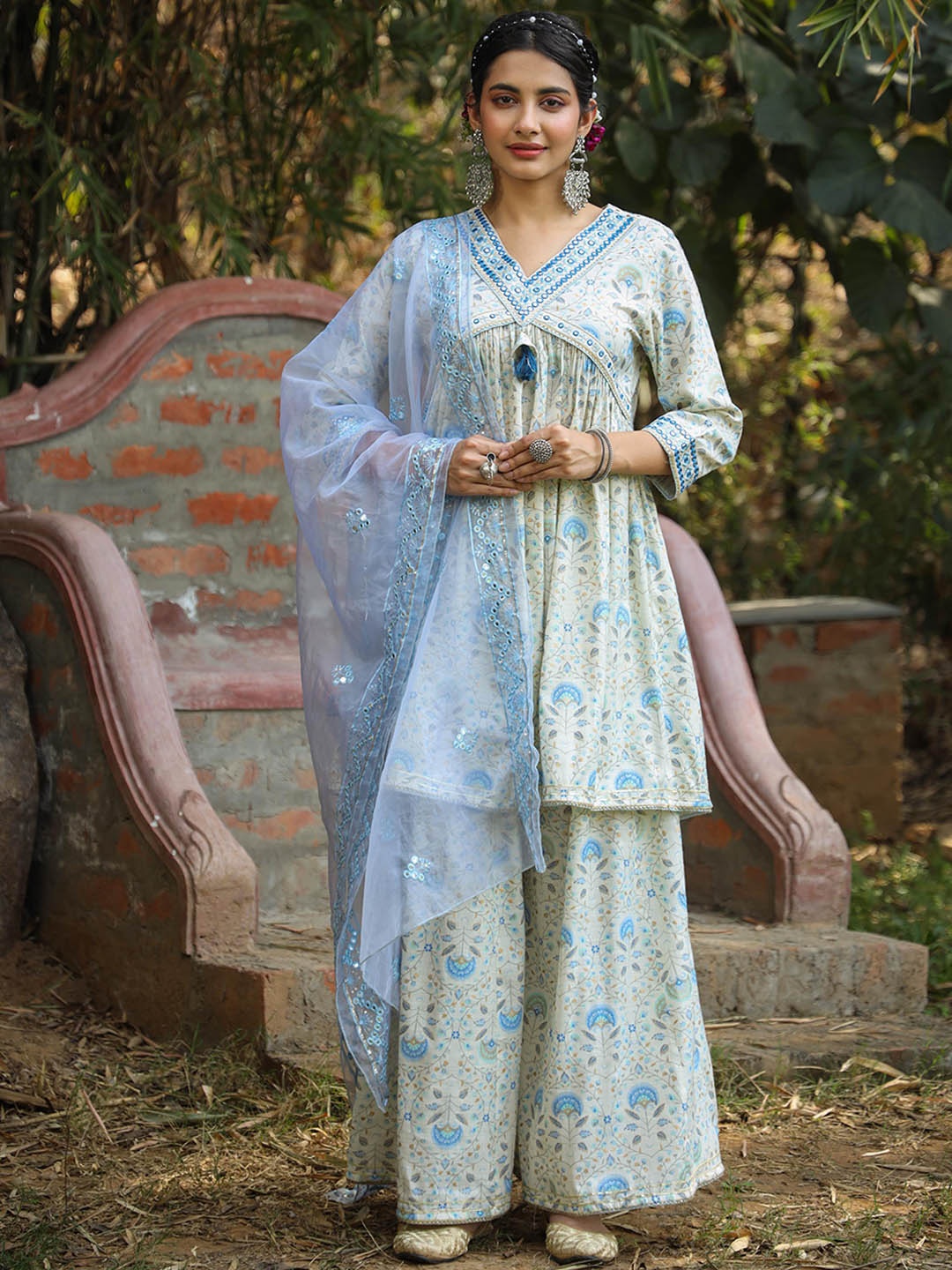 SCAKHI Floral Printed Pleated Pure Cotton Kurta With Sharara & With Dupatta, Off white
SCAKHI Floral Printed Pleated Pure Cotton Kurta With Sharara & With Dupatta, Off white