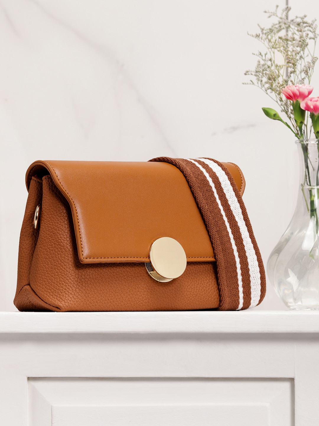 DressBerry Brown Solid Sling Bag 
DressBerry Brown Solid Sling Bag