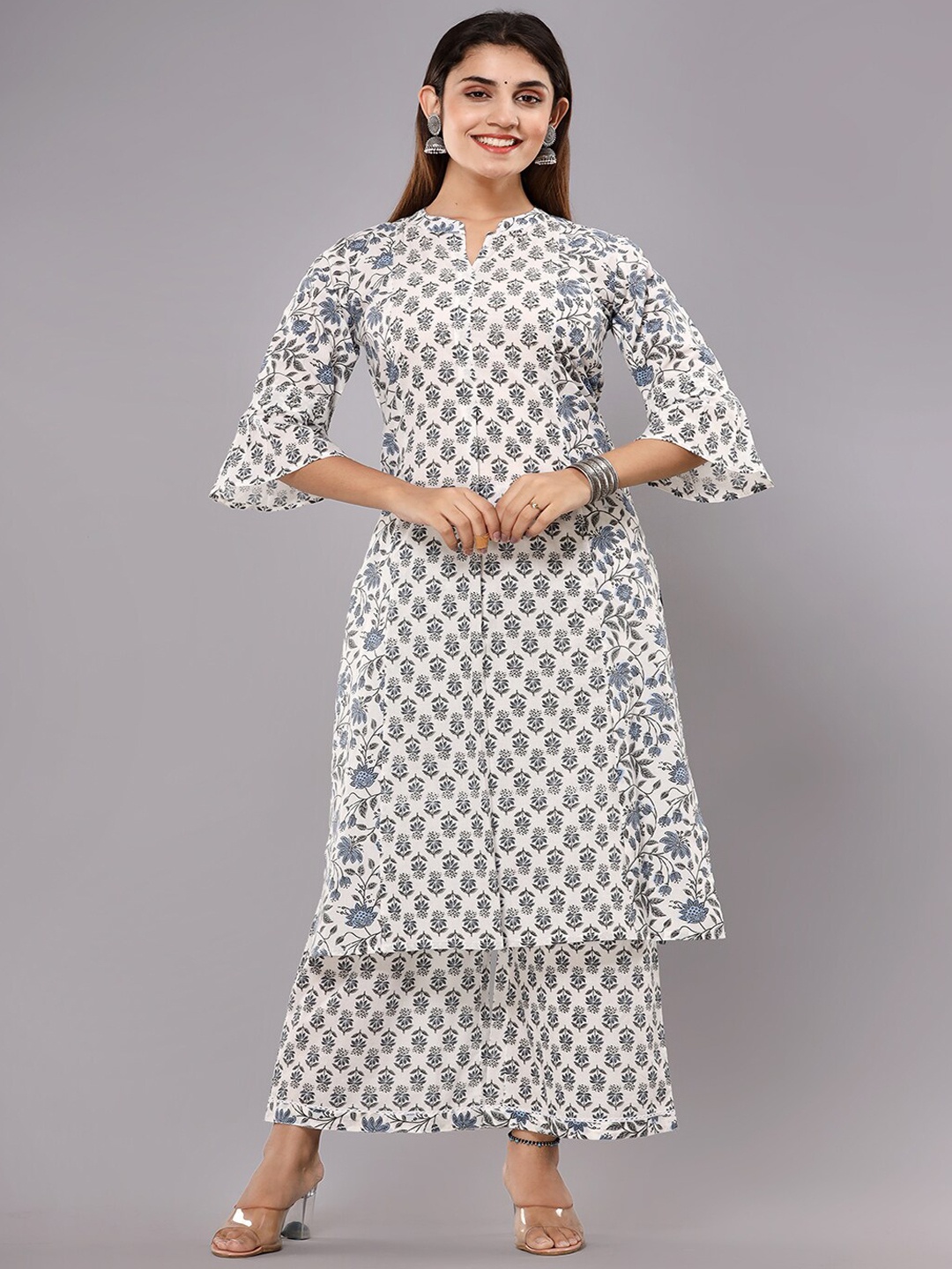 gvs shoppe Floral Printed Bell Sleeves Pure Cotton Regular Kurta with Palazzos & Dupatta, Grey
gvs shoppe Floral Printed Bell Sleeves Pure Cotton Regular Kurta with Palazzos & Dupatta, Grey