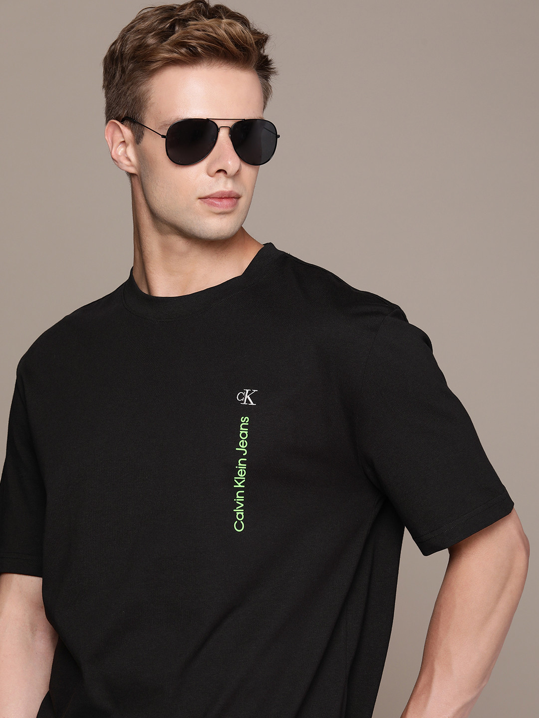 Calvin Klein Jeans Brand Logo Drop-Shoulder Sleeves Pure Cotton Applique Boxy T-shirt, Black
Calvin Klein Jeans Brand Logo Drop-Shoulder Sleeves Pure Cotton Applique Boxy T-shirt, Black