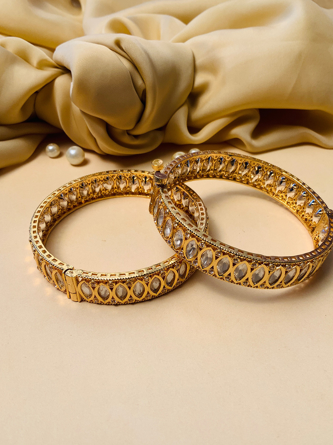 ABDESIGNS Set Of 2 Gold-Plated Stone-Studded Bangles
ABDESIGNS Set Of 2 Gold-Plated Stone-Studded Bangles