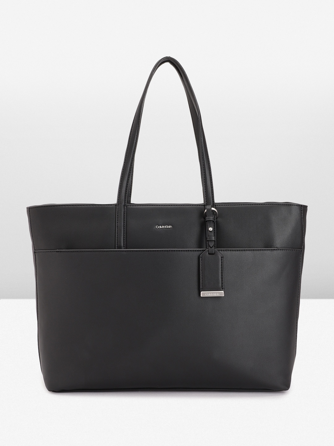 Calvin Klein Solid PU Oversized Structured Shoulder Bag with Tasselled Detail, Black
Calvin Klein Solid PU Oversized Structured Shoulder Bag with Tasselled Detail, Black