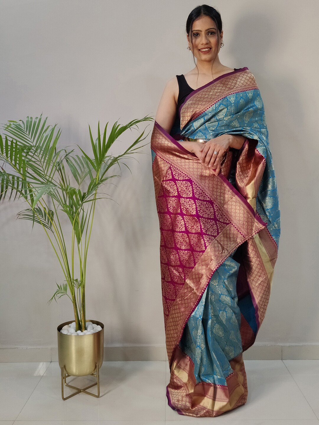 Mitera Turquoise Blue & Red Ethnic Motifs Woven Design Zari Art Silk Ready To Wear Saree
Mitera Turquoise Blue & Red Ethnic Motifs Woven Design Zari Art Silk Ready To Wear Saree
