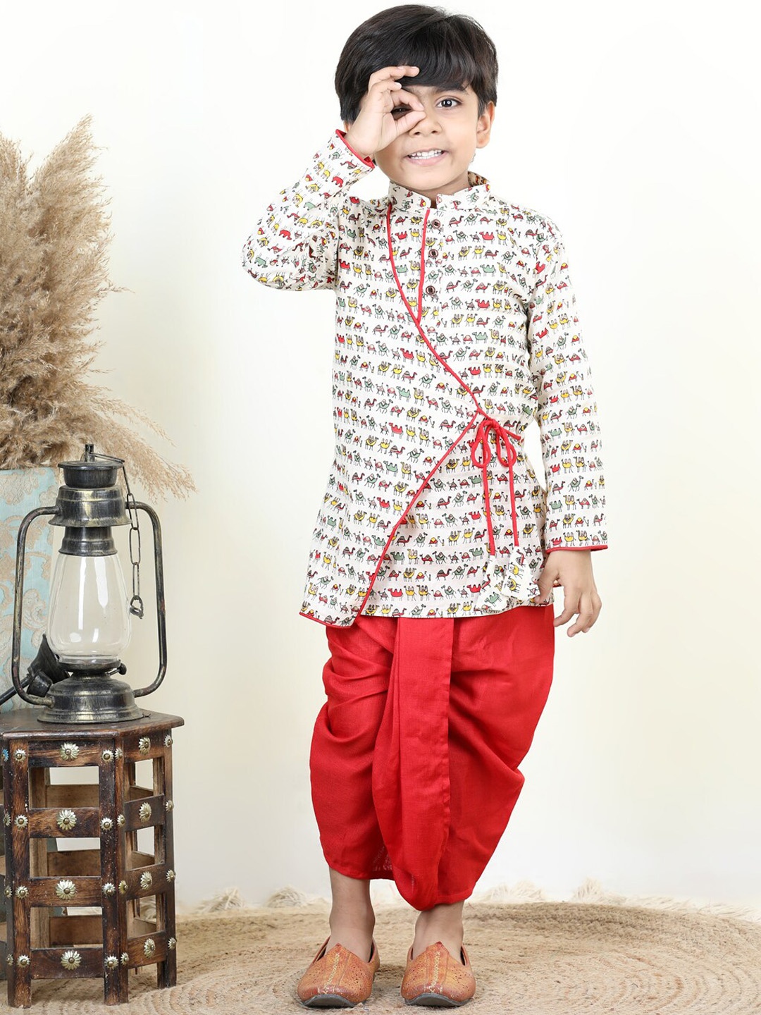 Here&Now X Kinder Kids Boys Conversational Printed Angrakha Pure Cotton Kurta with Dhoti Pants, Red
Here&Now X Kinder Kids Boys Conversational Printed Angrakha Pure Cotton Kurta with Dhoti Pants, Red