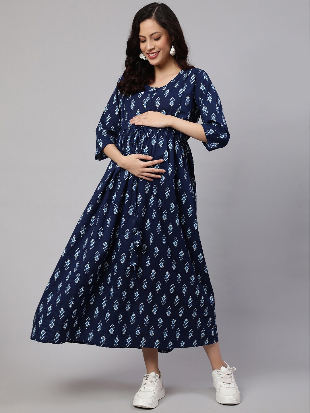 Nayo Blue Ethnic Motifs Printed Round Neck Tie Up Cotton Fit & Flare Maternity Dress
Nayo Blue Ethnic Motifs Printed Round Neck Tie Up Cotton Fit & Flare Maternity Dress