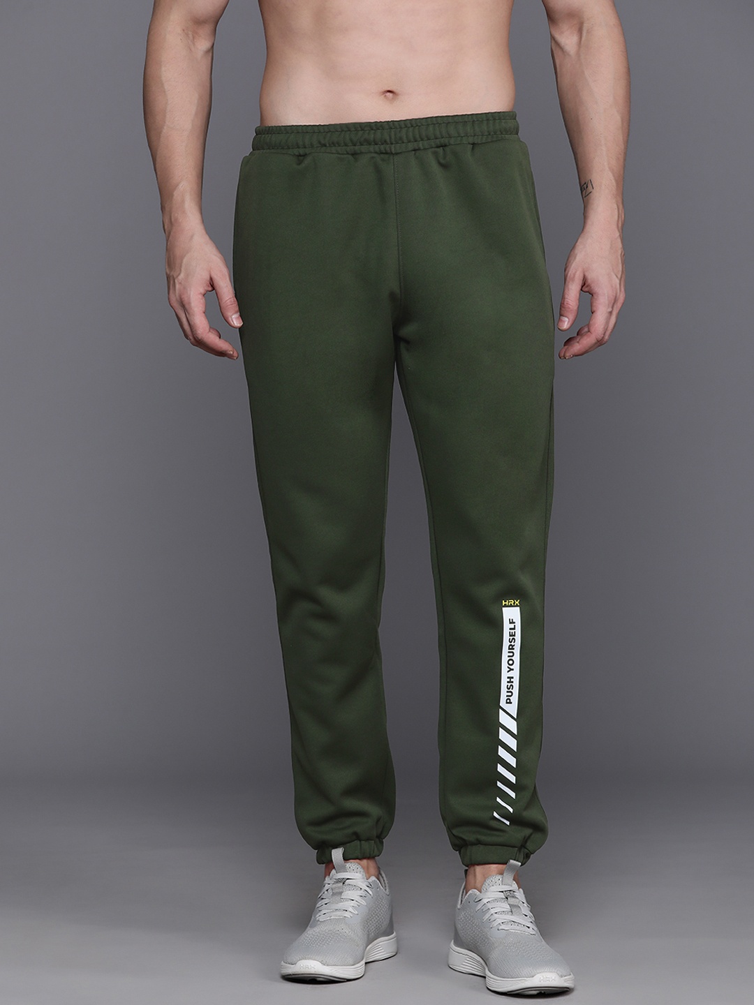 HRX by Hrithik Roshan Men Rapid-Dry Typography Training Joggers With Reflective Elements, Olive
HRX by Hrithik Roshan Men Rapid-Dry Typography Training Joggers With Reflective Elements, Olive
