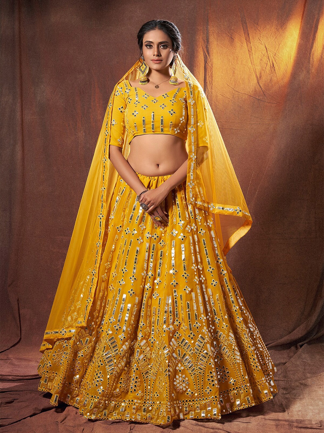 ODETTE Yellow Embroidered Mirror Work Semi-Stitched Lehenga & Unstitched Blouse With Dupatta
ODETTE Yellow Embroidered Mirror Work Semi-Stitched Lehenga & Unstitched Blouse With Dupatta