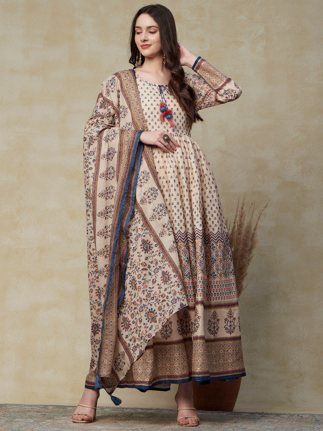 FASHOR Ethnic Motifs Printed Tie Up Neck Gathered Cotton Ethnic Dress With Dupatta, Cream
FASHOR Ethnic Motifs Printed Tie Up Neck Gathered Cotton Ethnic Dress With Dupatta, Cream