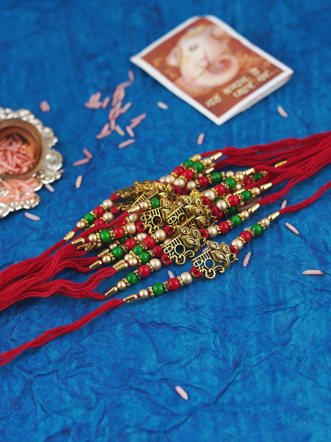 MANSIYAORANGE Set Of 12 Gold-Plated Elegant Ganesha Charm Tie-Up Rakhis, Multi