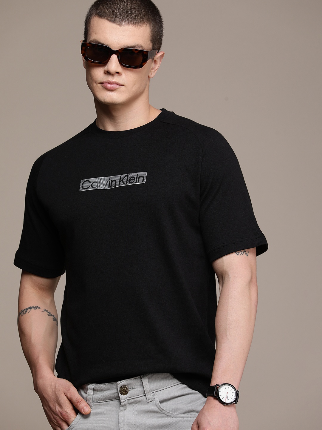 Calvin Klein Jeans Pure Cotton Brand Logo Applique Detail raglan Sleeves Casual T-shirt, Black
Calvin Klein Jeans Pure Cotton Brand Logo Applique Detail raglan Sleeves Casual T-shirt, Black