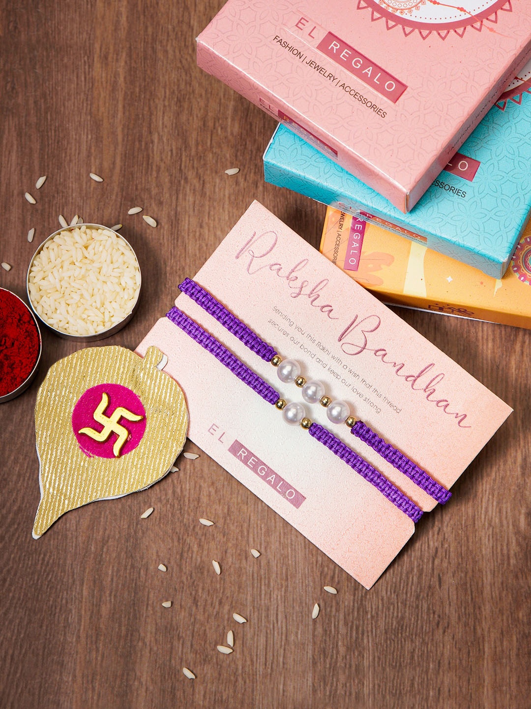 EL REGALO Set Of 2 Pearl Rakhi combo for Bhaiya and Bhabhi With Roli Chawal, Purple
EL REGALO Set Of 2 Pearl Rakhi combo for Bhaiya and Bhabhi With Roli Chawal, Purple