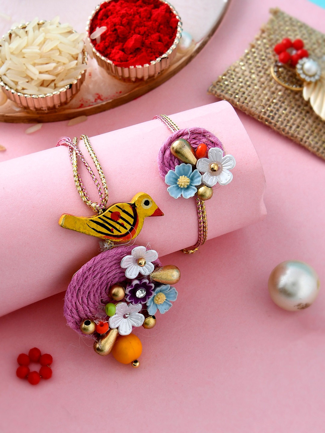 Aapno Rajasthan Set of 2 Stone-Studded & Beaded Rakhis With Roli, Chawal &Card, Purple
Aapno Rajasthan Set of 2 Stone-Studded & Beaded Rakhis With Roli, Chawal &Card, Purple