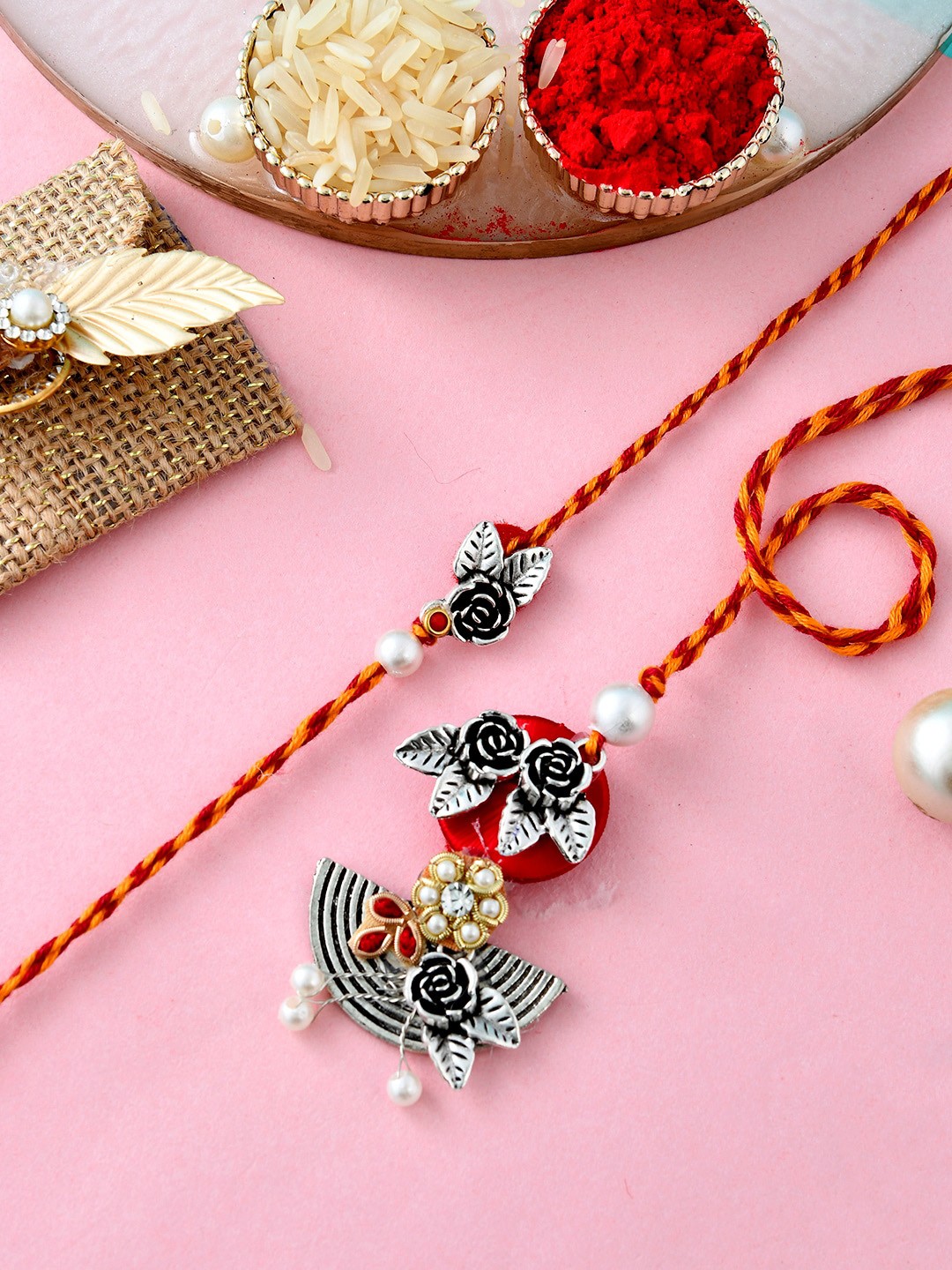 Aapno Rajasthan Unisex Set Of 2 Flower Design Rakhi With Roli, Rice & Greeting Card, Silver
Aapno Rajasthan Unisex Set Of 2 Flower Design Rakhi With Roli, Rice & Greeting Card, Silver