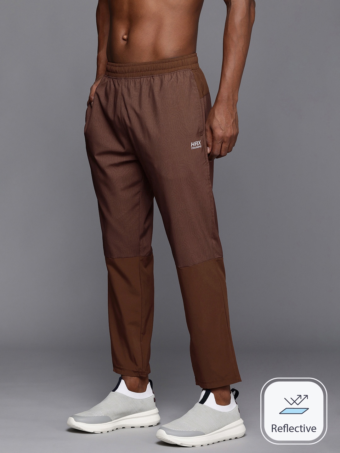HRX by Hrithik Roshan Men Printed Rapid-Dry Antimicrobial Training Track Pants, Brown
HRX by Hrithik Roshan Men Printed Rapid-Dry Antimicrobial Training Track Pants, Brown