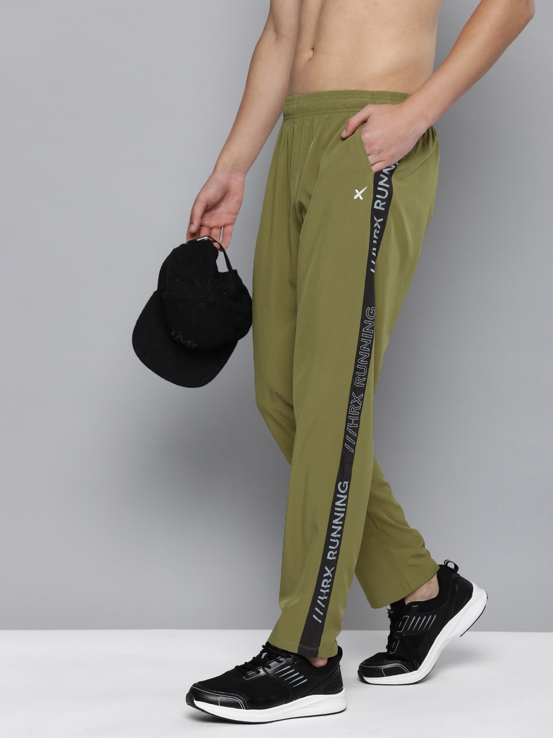 HRX by Hrithik Roshan Men Solid Rapid-Dry Running Track Pants With Side Stripes, Olive
HRX by Hrithik Roshan Men Solid Rapid-Dry Running Track Pants With Side Stripes, Olive