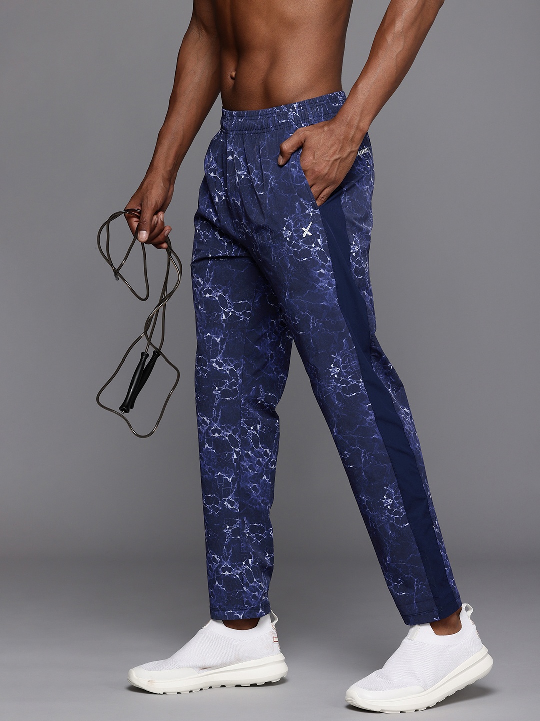 HRX by Hrithik Roshan Men Printed Rapid-Dry Antimicrobial Running Track Pants, Navy blue
HRX by Hrithik Roshan Men Printed Rapid-Dry Antimicrobial Running Track Pants, Navy blue