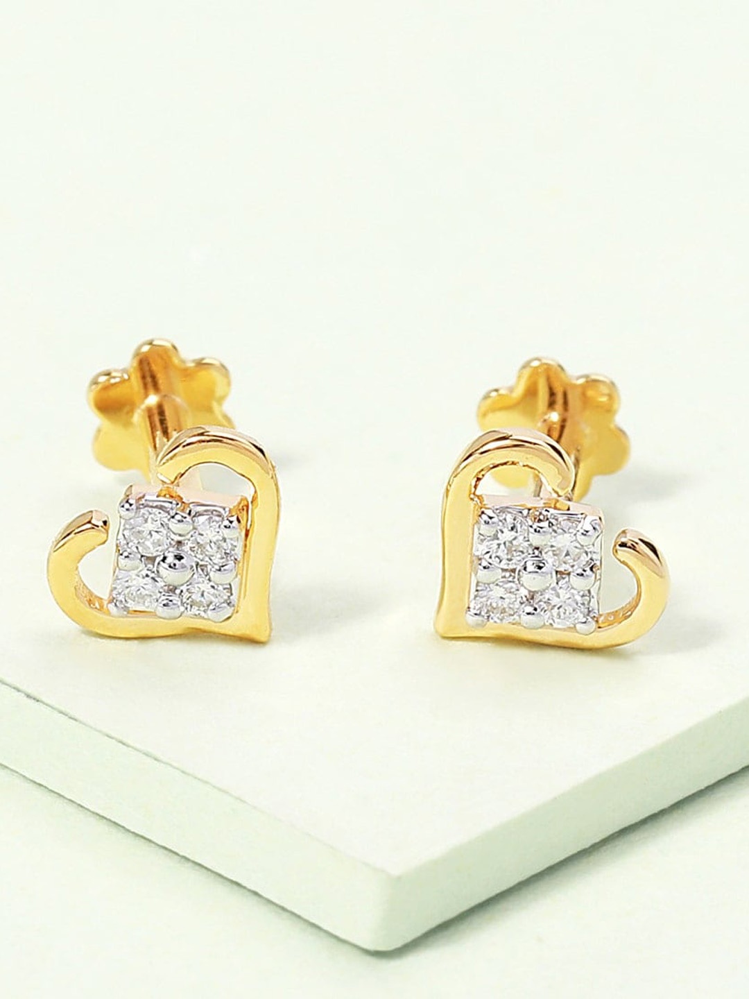 CANDERE A KALYAN JEWELLERS COMPANY 18KT BIS Hallmark Gold Diamond-Studded Earrings-0.85 gm
CANDERE A KALYAN JEWELLERS COMPANY 18KT BIS Hallmark Gold Diamond-Studded Earrings-0.85 gm