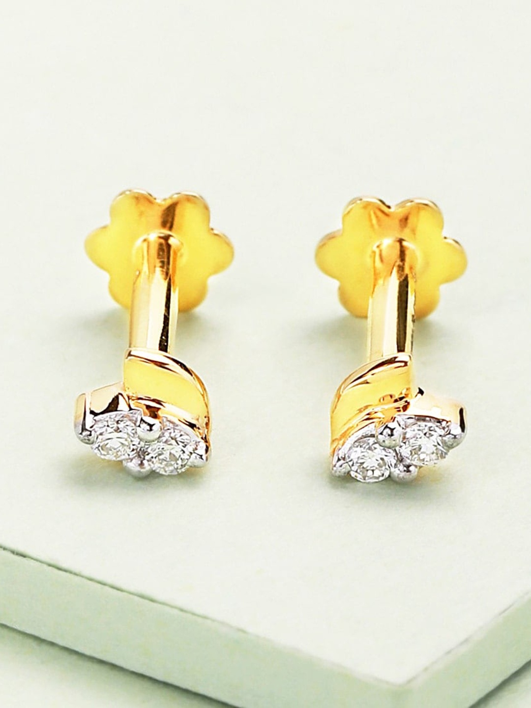 CANDERE A KALYAN JEWELLERS COMPANY 18KT BIS Hallmark Gold Diamond-Studded Earrings-0.6gm
CANDERE A KALYAN JEWELLERS COMPANY 18KT BIS Hallmark Gold Diamond-Studded Earrings-0.6gm