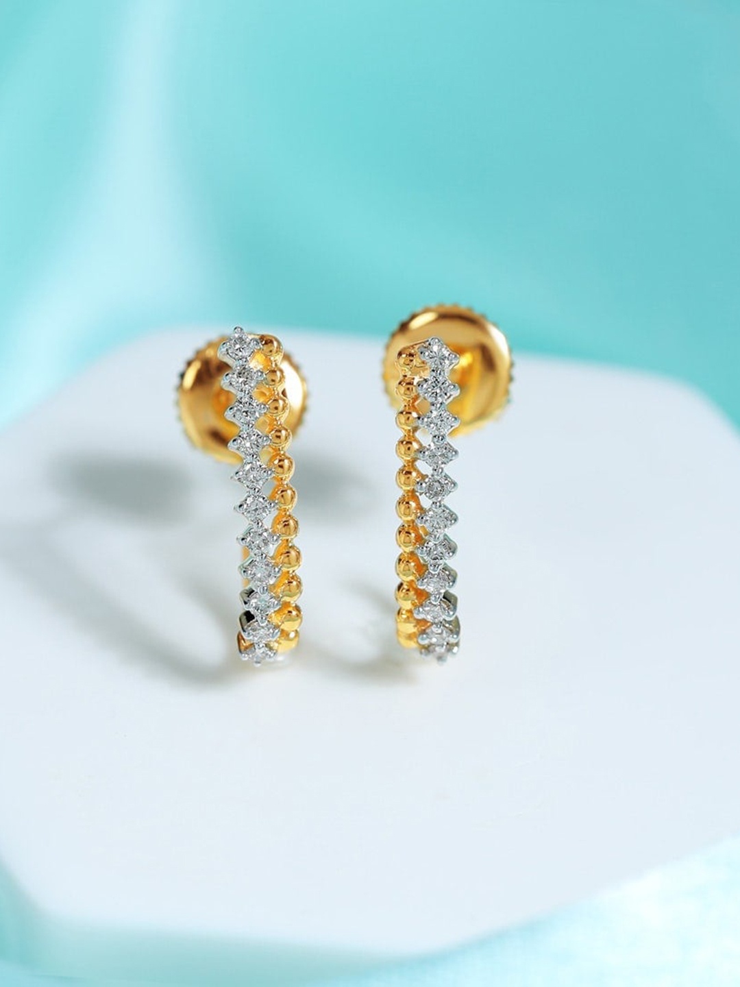CANDERE A KALYAN JEWELLERS COMPANY 18KT BIS Hallmark Gold Diamond-Studded Earrings-1.5gm
CANDERE A KALYAN JEWELLERS COMPANY 18KT BIS Hallmark Gold Diamond-Studded Earrings-1.5gm
