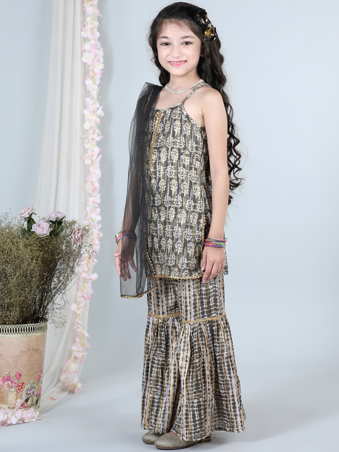 Cutiekins Girls Grey Ethinic Printed Regular Gotta Patti Kurta With Sharara & Dupatta
Cutiekins Girls Grey Ethinic Printed Regular Gotta Patti Kurta With Sharara & Dupatta