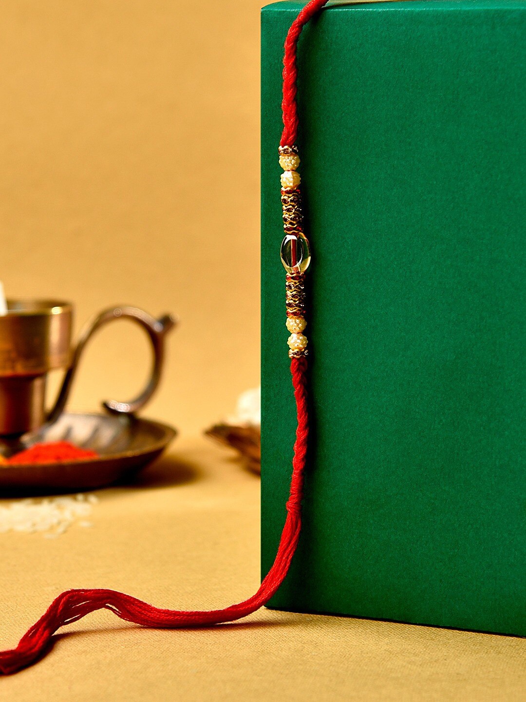 Zaveri Pearls Pearls Beaded Thread Rakhi, Red
