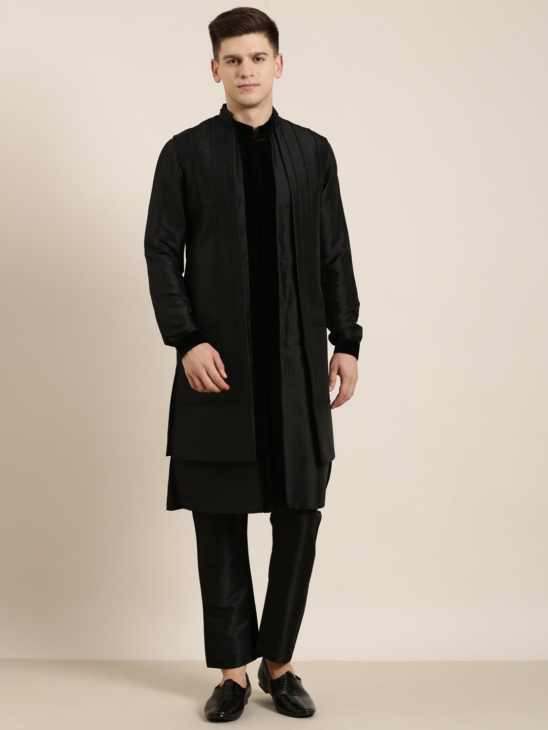 TheEthnic.Co Mandarin Collar Poly Silk Kurta & Pyjamas With Long Jacket, Black
TheEthnic.Co Mandarin Collar Poly Silk Kurta & Pyjamas With Long Jacket, Black