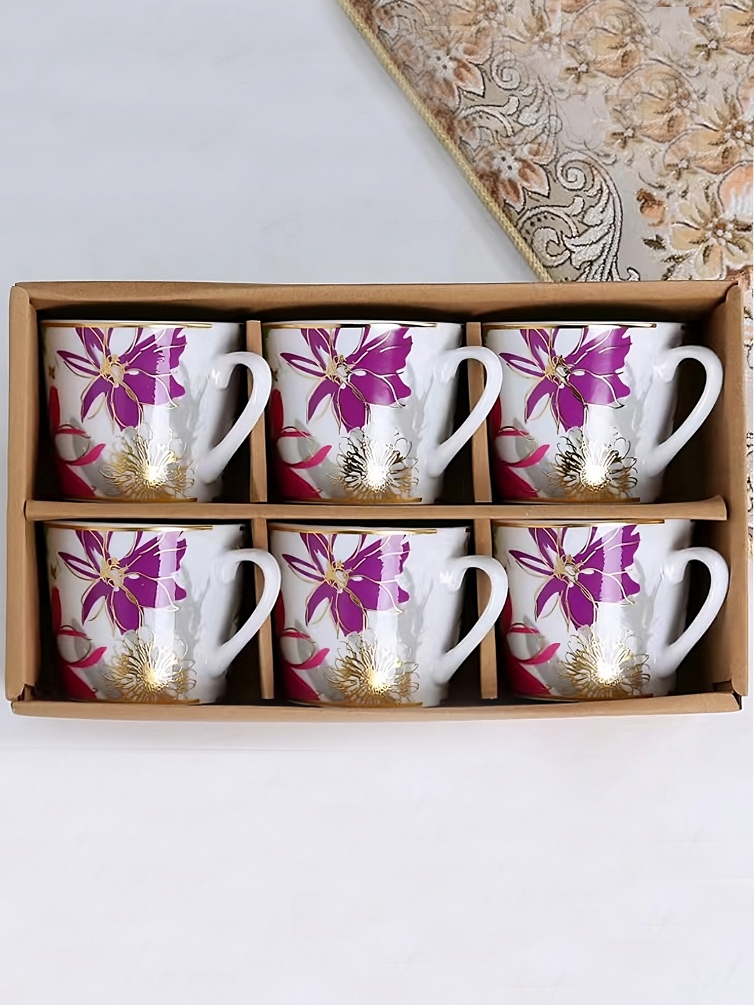 BonZeaL White & Purple Floral Printed 6 Pieces Printed Ceramic Glossy Cups - 170 ml Each
BonZeaL White & Purple Floral Printed 6 Pieces Printed Ceramic Glossy Cups - 170 ml Each