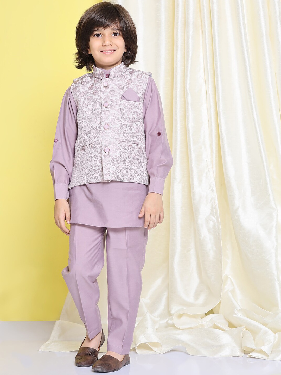 Aj DEZInES Boys Band Collar Pure Cotton Straight Kurta & Trousers with Nehru jacket, Purple
Aj DEZInES Boys Band Collar Pure Cotton Straight Kurta & Trousers with Nehru jacket, Purple