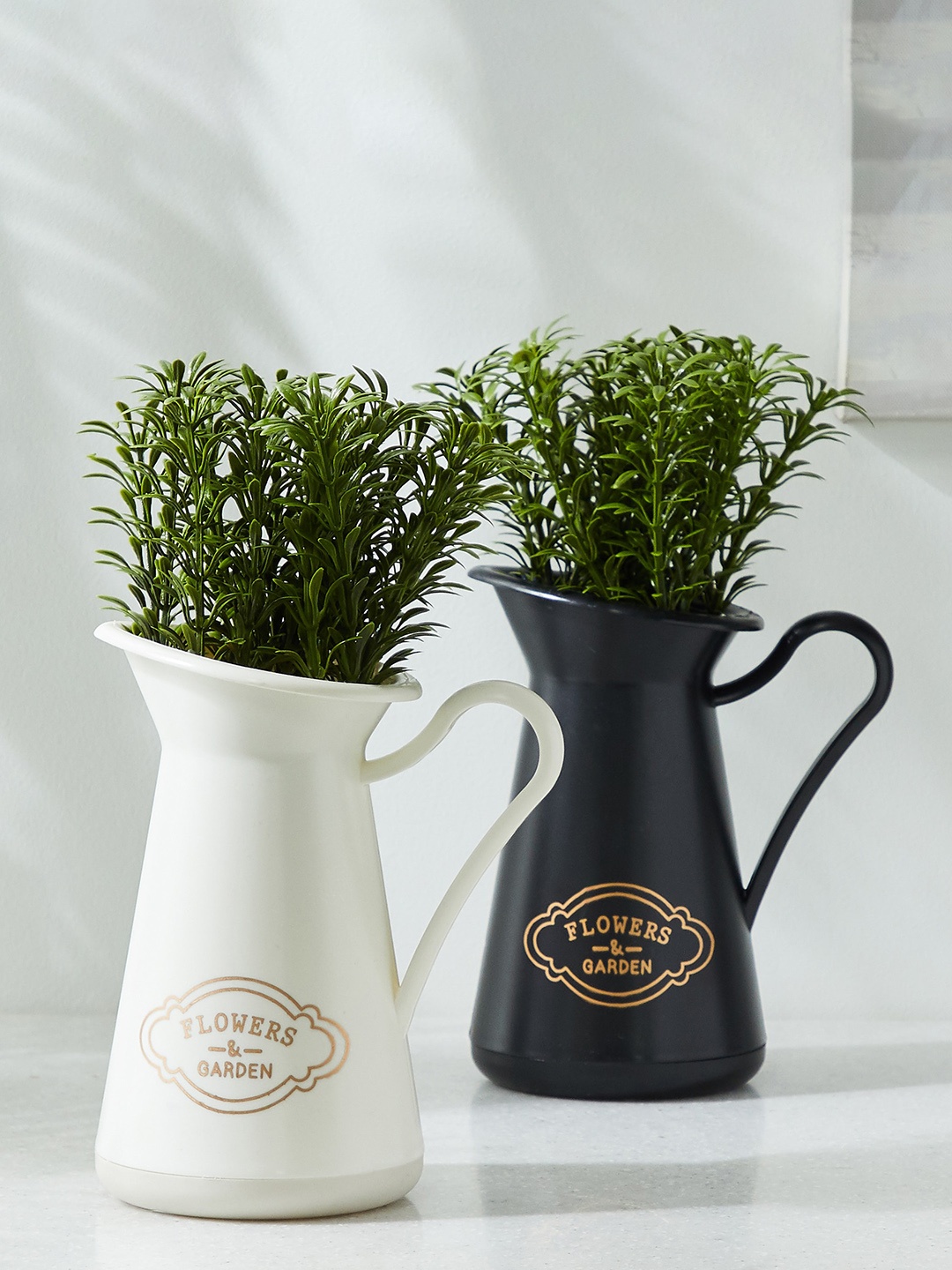 Home Centre Spinel Decor 2-Pcs Black & White Polypropylene Artificial Planters With Jug
Home Centre Spinel Decor 2-Pcs Black & White Polypropylene Artificial Planters With Jug