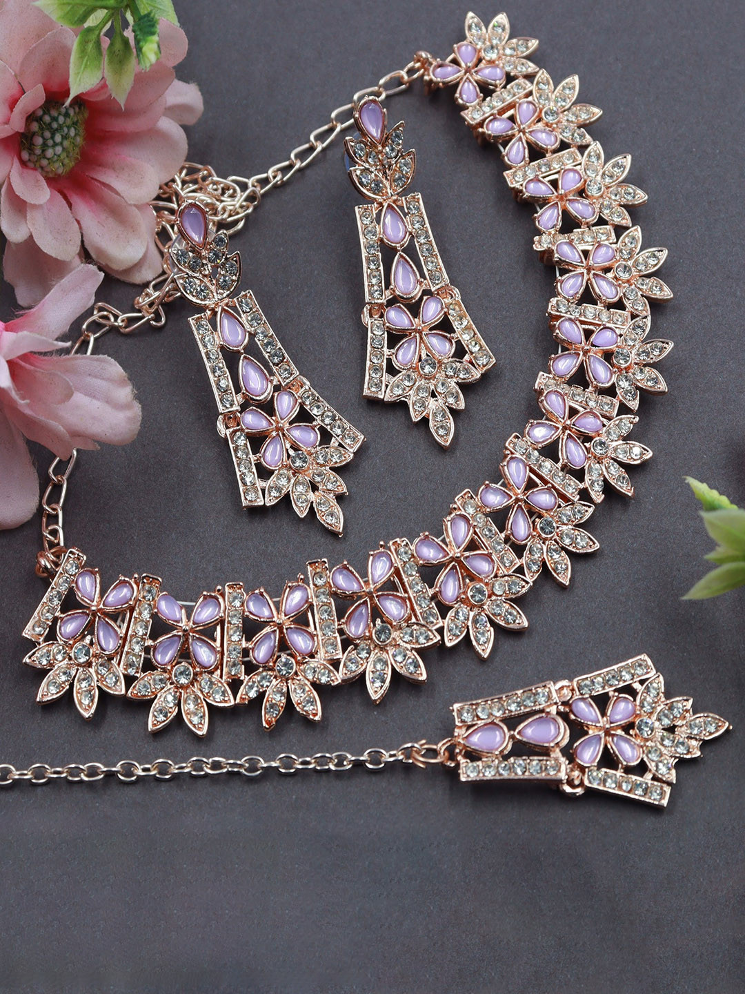 Rhymee Rose Gold-Plated AD Stone-Studded Choker Necklace With Earrings & With Maang Tika
Rhymee Rose Gold-Plated AD Stone-Studded Choker Necklace With Earrings & With Maang Tika
