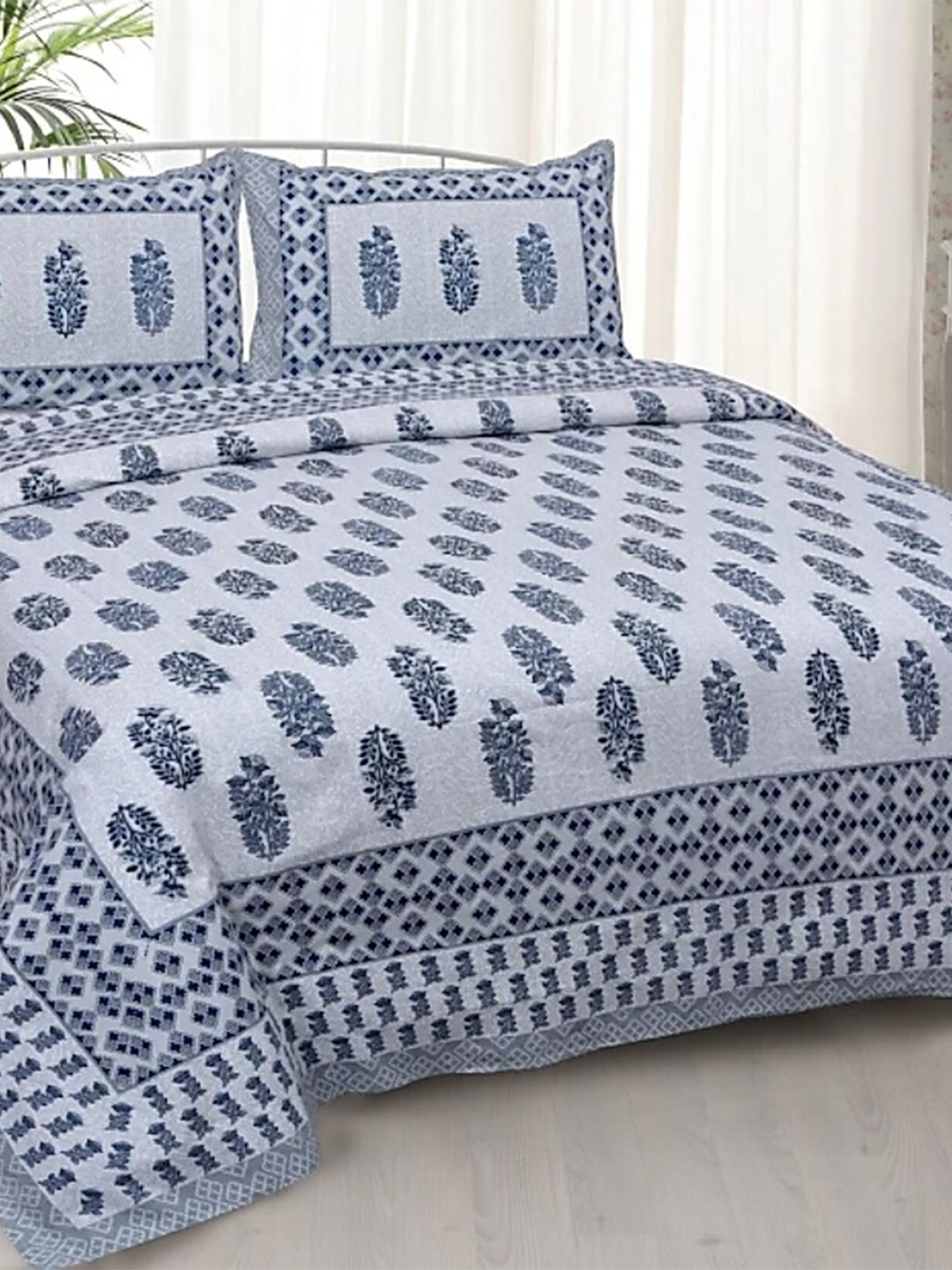 Lali Prints Blue & White Floral Printed Cotton 130 TC Queen Bedsheet With 2 Pillow Covers
Lali Prints Blue & White Floral Printed Cotton 130 TC Queen Bedsheet With 2 Pillow Covers
