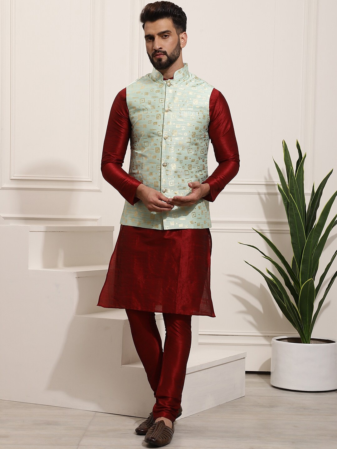 SOJANYA Band Collar Zari Work Kurta With Churidar & Embroidered Nehru Jacket, Maroon
SOJANYA Band Collar Zari Work Kurta With Churidar & Embroidered Nehru Jacket, Maroon