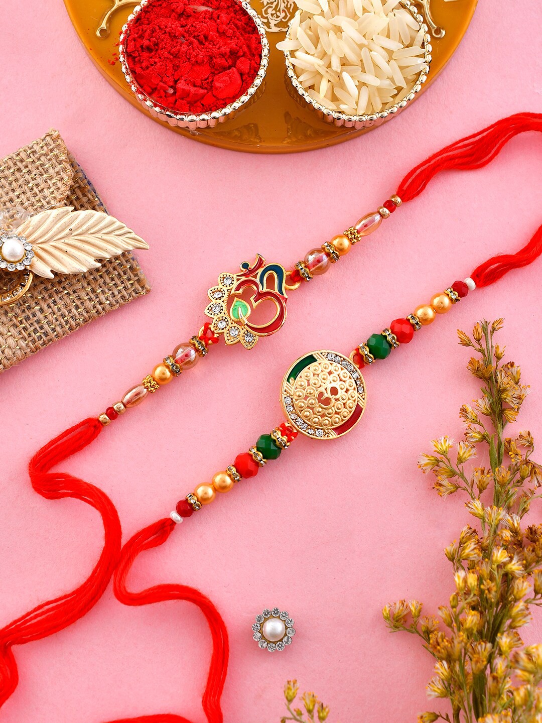 Aapno Rajasthan Set Of 2 Stone-Studded & Beaded Rakhi With Roli Rice & Greeting Card, Red
Aapno Rajasthan Set Of 2 Stone-Studded & Beaded Rakhi With Roli Rice & Greeting Card, Red